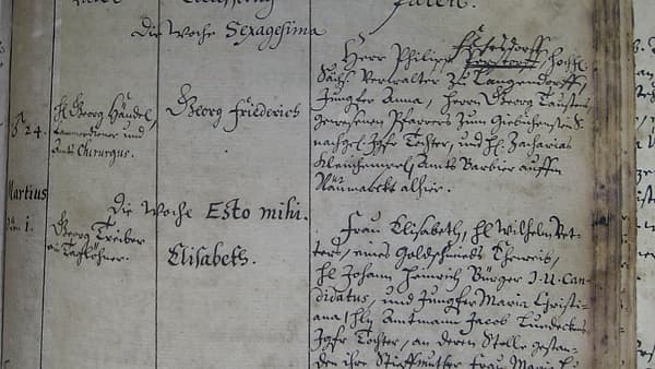 A page of a handwritten parish baptismal register, the entries listed in ink